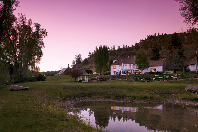 Antlers on the Creek Bed and Breakfast at dusk with a Purple Sunset in Durango, Colorado