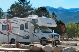RV parked at Arrowhead Point Campground Cabins and RV Park in Buena Vista Colorado