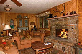 Fire place inside a log mountain cabin at Bear Paw Cabin and Double K Ranch in Estes Park Colorado