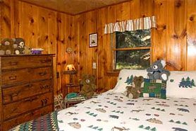 Cozy bedroom at Bear paw cabins and Double K Ranch in Estes Park Colorado