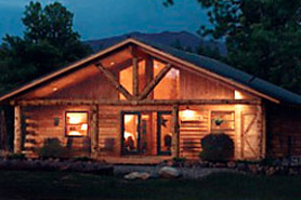 Night time shot of a cabin at Cabins at Hartland Ranch in the Pagosa Springs area