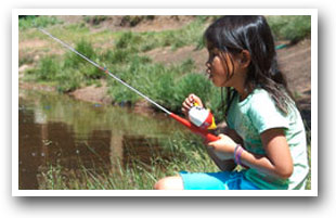 Girl Fishing with Grandpa in Colorado