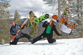 Skiiers and snow boarders in front of Parry in Winter Park, Colorado.