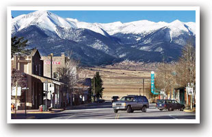 Main Street in Westcliffe, Colorado with mountains in the background