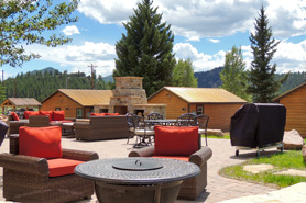 Beautiful outdoor patio area at Mountain River Lodge Luxury Cabin Rentals in Lake George, Colorado