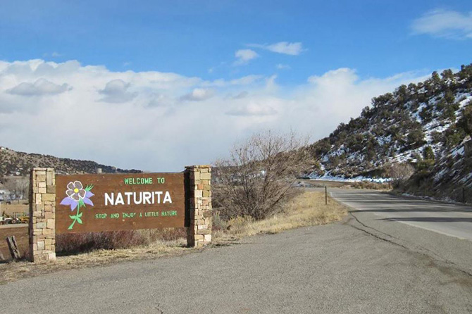 Naturita welcome sign along highway in Colorado