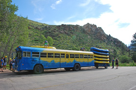 Bus loaded up with rafts ready to go rafting, Photo courtesy of Boy Scout Troop 77 - Boulder, CO