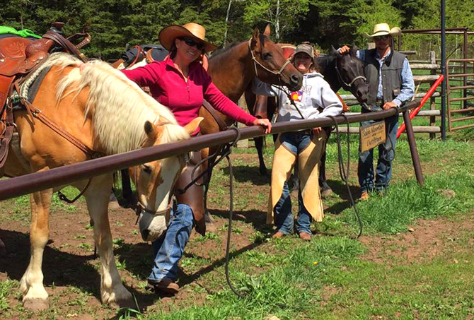 Horses lined up and ready to ride at Sable Mountain Outfitters in Meeker, Colorado