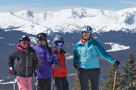 Family of skiers at Ski Cooper Resort, Leadville, Colorado