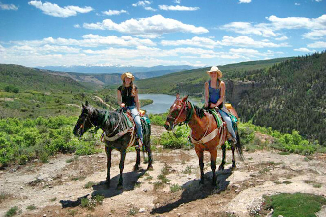 AJ Brink Outfitters riders on horses on trail ride near Sweetwater, Vail, and Glenwood Springs, Colorado. Our Trail Rides are Custom Trips into Flat Tops Wilderness Area -- Including a Cave Ride
