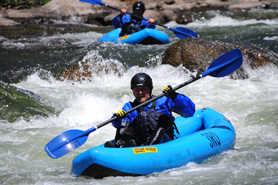 Blue Kayak on the upper East River near Gunnison Colorado with Three Rivers Resort and Outfitting. Kayaking Adventures on Upper East River.