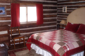 Antero Hot Springs Cabins with Authentic log cabin bedroom in the Buena Vista Area, Colorado