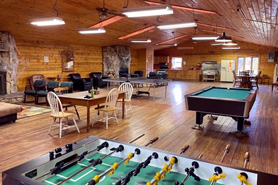 Recreation Hall with foosball, ping-pong and pool table at Aspen Acres Campground located within the Greenhorn Valley in Rye, Colorado.