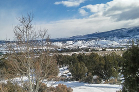 Trees and mountain in winter near Aunt Sara's River Dance RV Resort in Gypsum, Colorado near Vail.