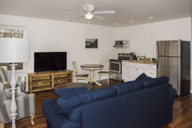 Inside view of living room in Aspen Grove Bungalow at Cabins on the Ranch in Westcliffe, Colorado.