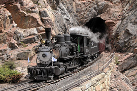Cumbres and Toltec Narrow Gauge Train coming out of a rock tunnel between Antonito, CO and Chama, MN.