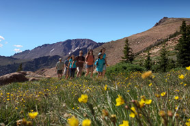 Family hiking along trail around Pikes Peak near Colorado Springs, Colorado. Photo Credit: Colorado Springs CVB, Convention and Visitors Bureau