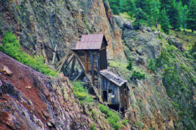 The Commodore Mine structure on a cliff near Creede, Colorado