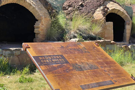 Plaque describing the Coke Ovens in the background at Redstone, Colorado.