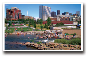 People playing in the water at Confluence Park in Denver, Colorado