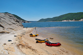 Individual paddle rafts on beach at McPhee Reservoir near Dolores Mountain Inn in Dolores, Colorado