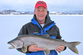 Man holding lake trout caught in Granby, Colorado