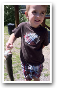 Boy caught his first fish in Colorado