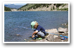 Kid learning to fish in Colorado