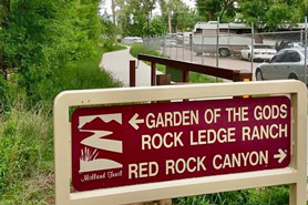 Garden of the Gods, Rock Ledge Ranch and Red Rock Canyon sign at entrance of Fountain Creek RV Park located in Colorado Springs, Colorado.
