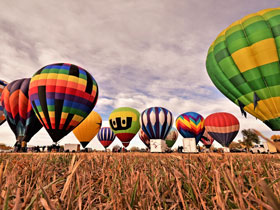 Colorful Hot Air Balloons ready to take off at the Arkansas Valley Balloon Festival in Rocky Ford, Colorado