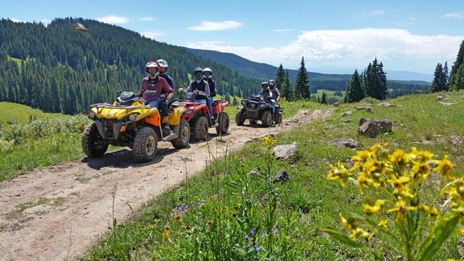 ATV riders on tour with Altitude Outdoor Adventure in Grand Mesa Area, Colorado.