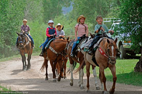 Horseback riding on the Drowsy Water Trail, Arapahoe National Forest near Hot Sulphur Springs, Colorado.