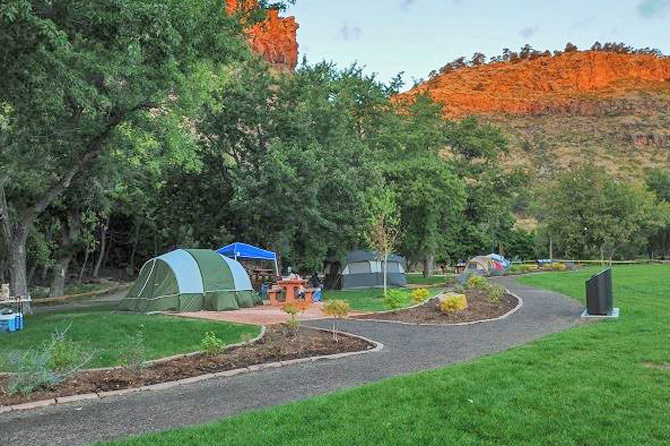 A few tents set up at a tent site at LaVern Johnson Park RV Full Hookup Camping in Lyons near Estes Park. Tent Camping. Picnic Areas. Shelter Facilities.