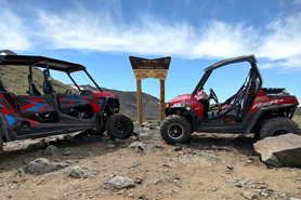 Two UTVs, rented from BV Jeeps and ATVs, parked next to St. Elmo pass near St. Elmo, Colorado