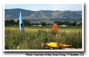 kayaks docked along the Poudre River, Photo courtesy of Boy Scout Troop 77-Boulder, CO