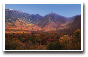 Mountain Range with fall colors and blue sky in Montrose, Colorado