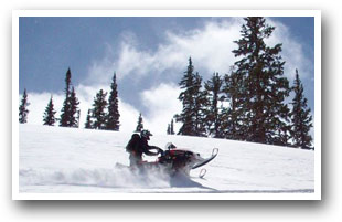 Snowmobiling in the Grand Mesa area, Colorado