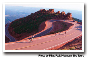 Biking the Pikes Peak Toll Road Scenic Drive in Colorado.