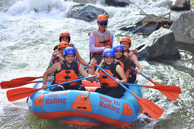 Whitewater rafting trip going down Clear Creek Canyon with Mile Hi Rafting near Idaho Springs, Colorado.