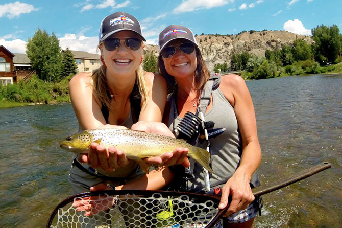 Two women fishing with Minturn Anglers on a Guided Fly Fishing Trip in Minturn, Colorado
