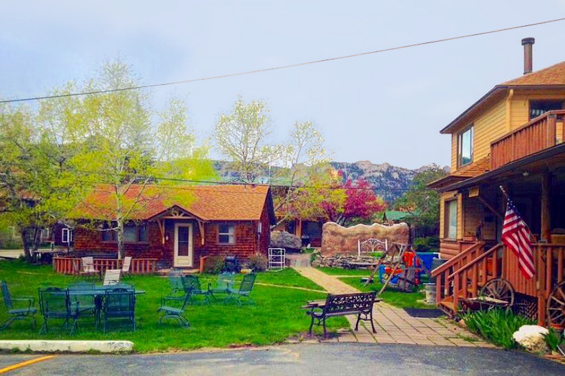 Cabins at the Misty Mountain Lodge in Estes Park, Colorado. Have a vacation retreat surrounded by trees, Fall River, and the Rocky Mountains.