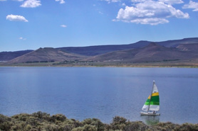 Sail boat on Blue Mesa Reservoir, located between Montrose and Gunnison, CO