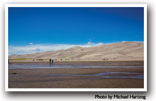 The entrance to the Sand Dunes with Medano Creek out in front, Colorado, Photo by Michael Hartzog