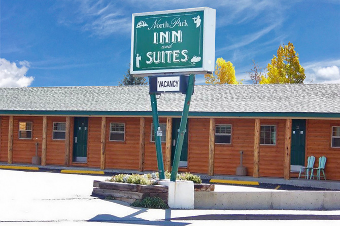 View of entrance and vacancy sign at North Park Inn and Suites in Walden, Colorado.
