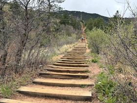 Beginning of the steep Manitou Incline Trail steps in Manitou Springs, Colorado.