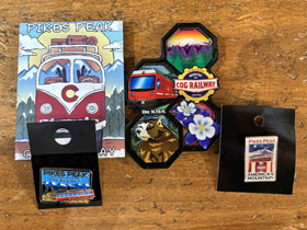 Display of Pikes Peak souvenirs from local tourist attractions in Colorado.