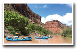 Blue rafts in the San Miguel River Colorado Vacation Directory