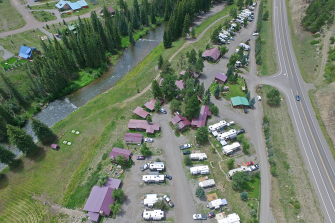 Birds eye view of Riverbend Resort property in the Summer time in South Fork, Colorado. Located on the Banks of the South Fork of the Rio Grande with 1 Mile of Private River Frontage Stocked with Trophy-Size Rainbow Trout.