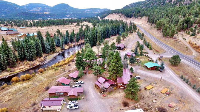 Overhead view of Riverbend Resort property in the Summer time in South Fork, Colorado. Located on the Banks of the South Fork of the Rio Grande with 1 Mile of Private River Frontage Stocked with Trophy-Size Rainbow Trout.