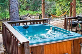 A secluded hot tub at Hideout Cabins near Allenspark, Lyons, and Estes Park, Colorado 